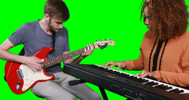 Man and Woman Playing Instruments against Green Screen Background - Download Free Stock Images Pikwizard.com