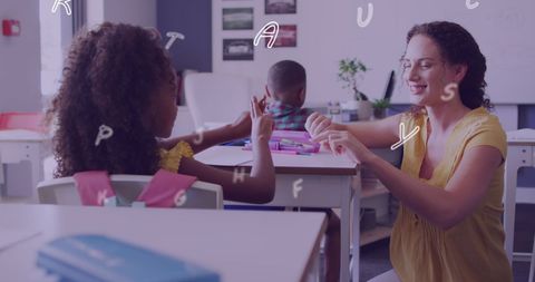 diverse teacher and student engaging in sign language - Download Free Stock Images Pikwizard.com