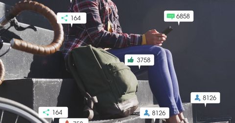 Young Woman Engaging with Smartphone and Social Media