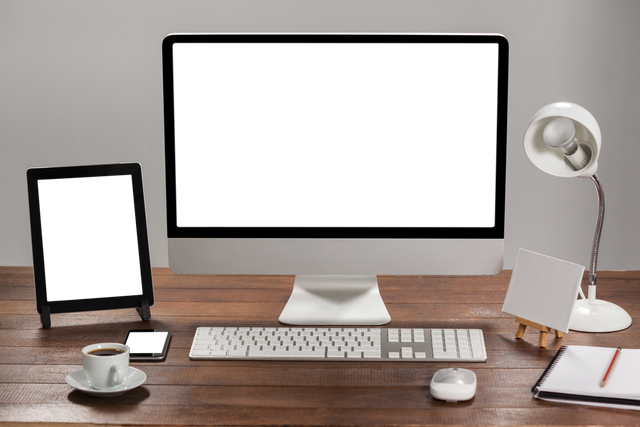 Modern Office Desk with Computer and Tablets on Wooden Surface - Download Free Stock Videos Pikwizard.com