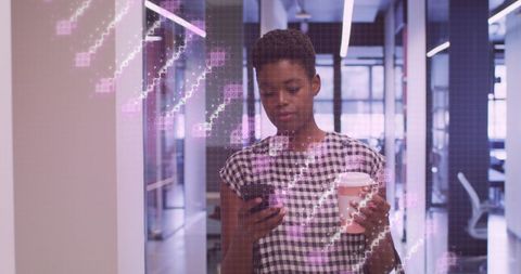 Businesswoman Interacting with Digital DNA Interface in Office