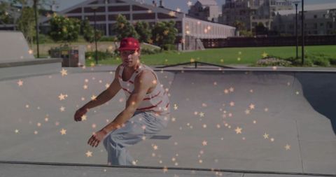Skateboarder Enjoying Thrilling Ride in Concrete Bowl at City Park