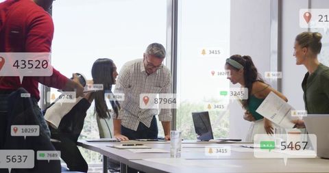 Cross-functional team collaborating around conference table with digital metrics overlays