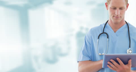 Healthcare Professional Using Tablet in Modern Medical Environment
