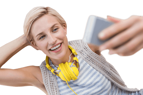 Smiling Woman with Headphones Taking Transparent Selfie - Download Free Stock Videos Pikwizard.com