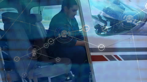 Modern Pilot Using Advanced Digital Interface in G600 Aircraft