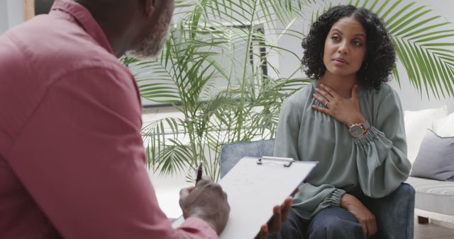 Therapist Listening to Woman during Counseling Session - Download Free Stock Images Pikwizard.com