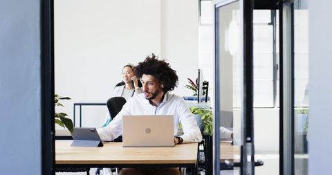 Business Professionals in Modern Office Collaborating