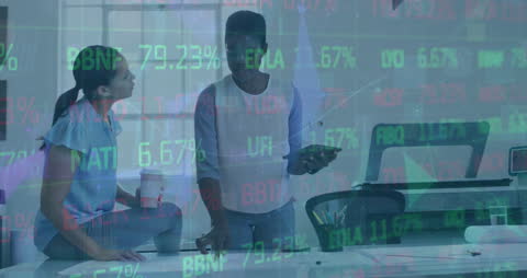 Multiracial Business Team Analyzing Financial Data in Modern Office