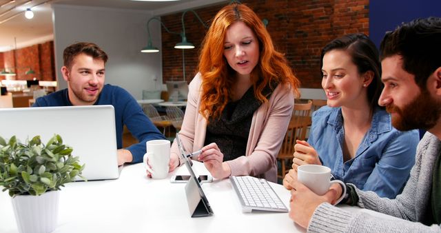 Group of Young Professionals Collaborating in Modern Office Setting - Download Free Stock Images Pikwizard.com