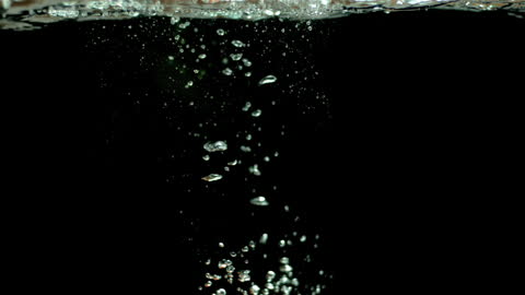 Whirlpool of Bubbles in Water with Black Background