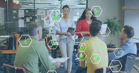 Team Collaboration with Digital Text Icons in Modern Office