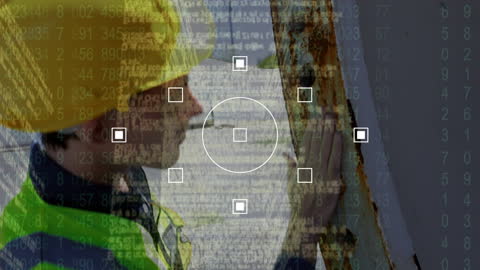 Builder Analyzing Construction with Digital Interface Overlay