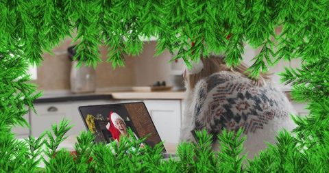 Woman Enjoying Virtual Christmas Gathering with Santa Hat - Download Free Stock Images Pikwizard.com