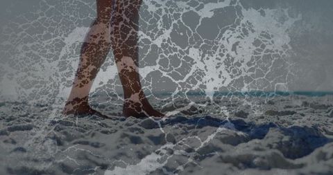 Barefoot walking on sandy shoreline with cracked texture double exposure minimalist beach