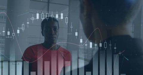 diverse women discussing finance with graph holograms - Download Free Stock Images Pikwizard.com