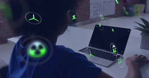 Woman working on laptop with floating green eco icons virtual interface for sustainability