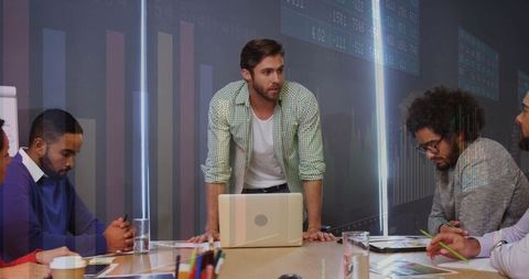 Team Meeting Focused on Data Analysis and Collaboration