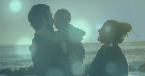 Family Bonding at Sunset on Tranquil Rocky Beach