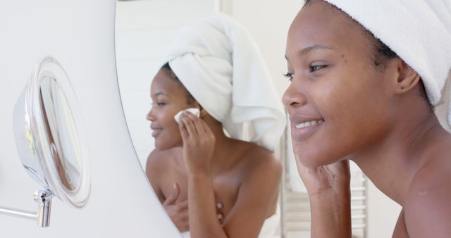 Young Woman Cleansing Face with Soft Towel Quits Spa Look - Download Free Stock Images Pikwizard.com