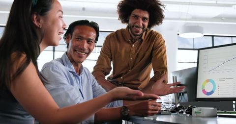 Diverse Co-Workers Collaborating on Office Project