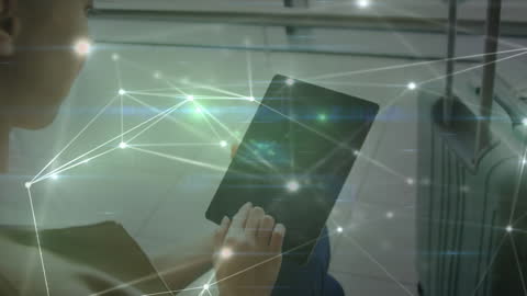 Businesswoman Using Tablet with Network Connections Overlay