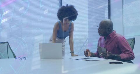 Colleagues Collaborating in Modern Corporate Office Setting