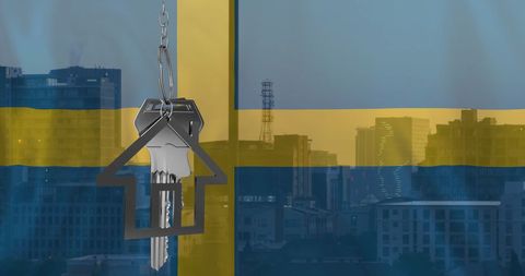 Real Estate Concept with Key and Sweden Flag Cityscape Overlay