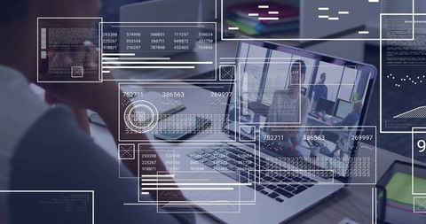 Woman Leaning at Desk Viewing Virtual Meeting on Laptop with AR Dashboards and Analytics