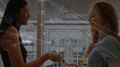 Women Shaking Hands with Digital Network Overlay Reflecting Collaboration
