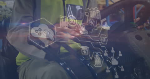 Woman Using Digital Interface in Warehouse Environment