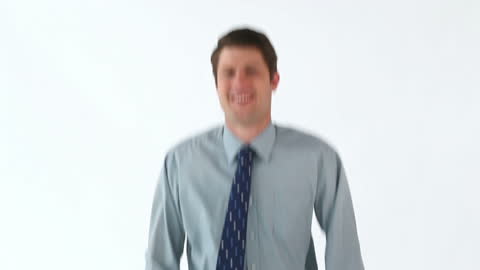 Businessman Smiling and Hopping Against White Background