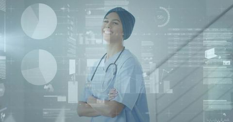 Smiling nurse in blue scrubs with stethoscope and augmented reality healthcare dashboard
