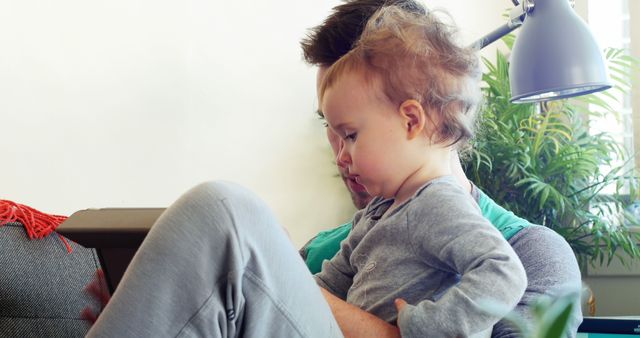 Parent Reading to Toddler in Cozy Living Room Environment - Download Free Stock Images Pikwizard.com