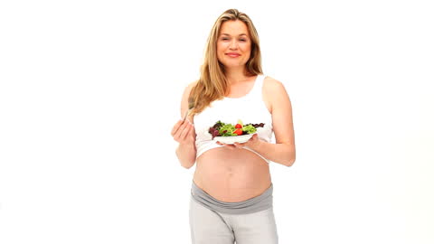 Pregnant Woman Enjoying Healthy Salad with White Background