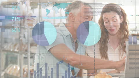 Caucasian Couple Analyzing Financial Data on Laptop with Digital Overlay