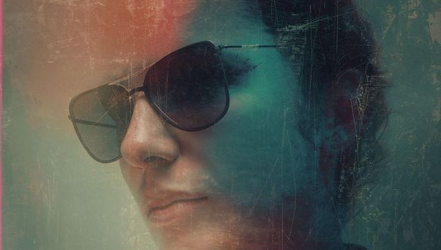 Artistic Portrait of Woman in Tinted Aviators with Gradient Backdrop