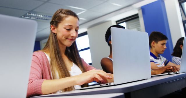 Teenage Students Studying on Laptops in Classroom - Download Free Stock Images Pikwizard.com