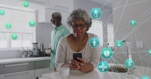 Senior Woman Using Smartphone for Health Monitoring in Connected World