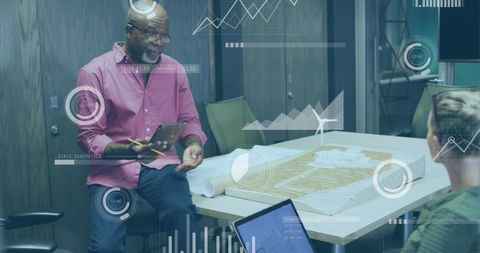 Diverse Team Working with Financial Data and Analysis Graphs