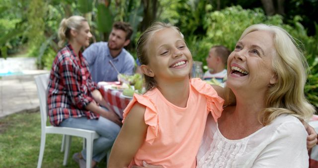 Joyful Moments at Family Outdoor Gathering - Download Free Stock Images Pikwizard.com