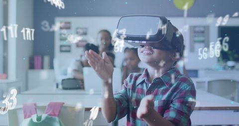 Boy Using VR Headset Surrounded by Floating Numbers in Classroom - Download Free Stock Images Pikwizard.com