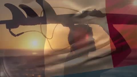 Silhouette of Surfer with Surfboard Against Sunset Ocean