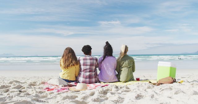 Group of Friends Sitting on Beach by Ocean - Download Free Stock Images Pikwizard.com