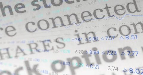 Macro close-up showing financial newspaper text with blue stock values and thin line chart