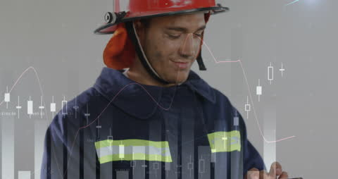 Firefighter Engaging with Technology Analyzing Data