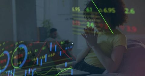 Woman Analyzing Stock Market Charts on Laptop in Comfortable Home Setting