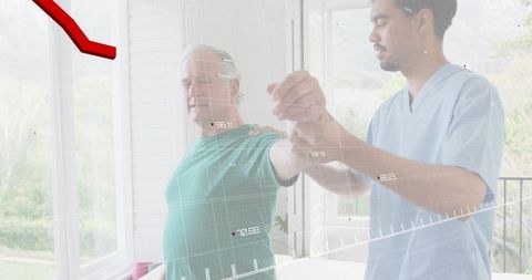 Caregiver assisting senior raising arm for rehabilitation on sunroom with natural light