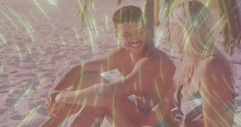 Couple enjoying romantic beach moments amidst shady palms