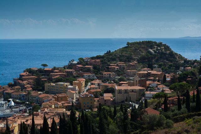 Coastal Mediterranean Town with Hillside Village Overlooking Sea - Download Free Stock Images Pikwizard.com